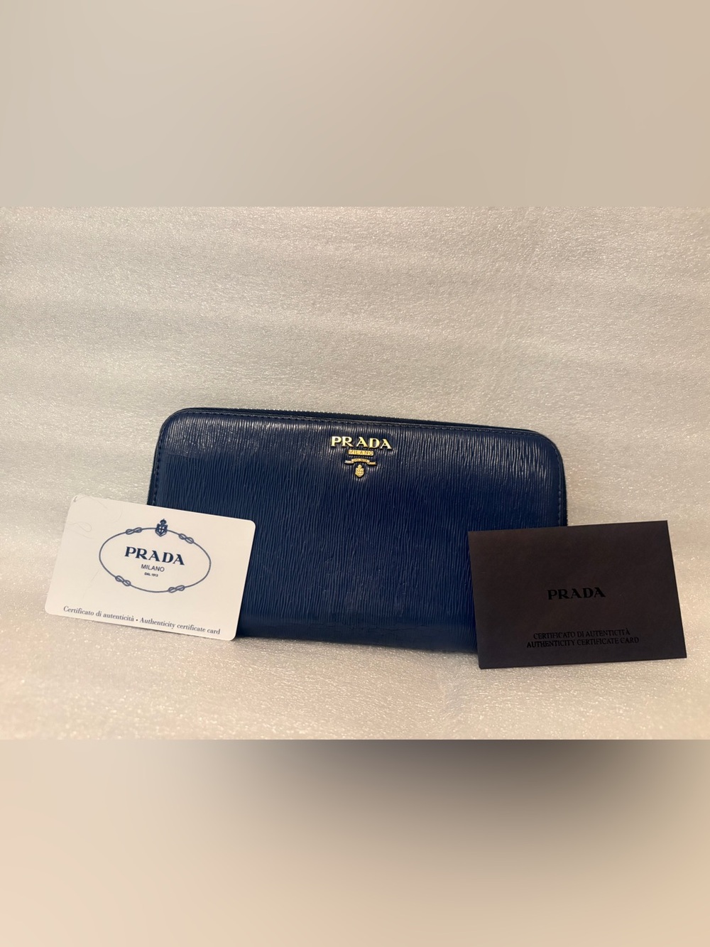 PRADA 1ML348 Vitello Move Bluette Blue Leather Continental Authenticity Card